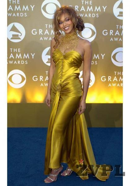 Beyonce v zlati obleki